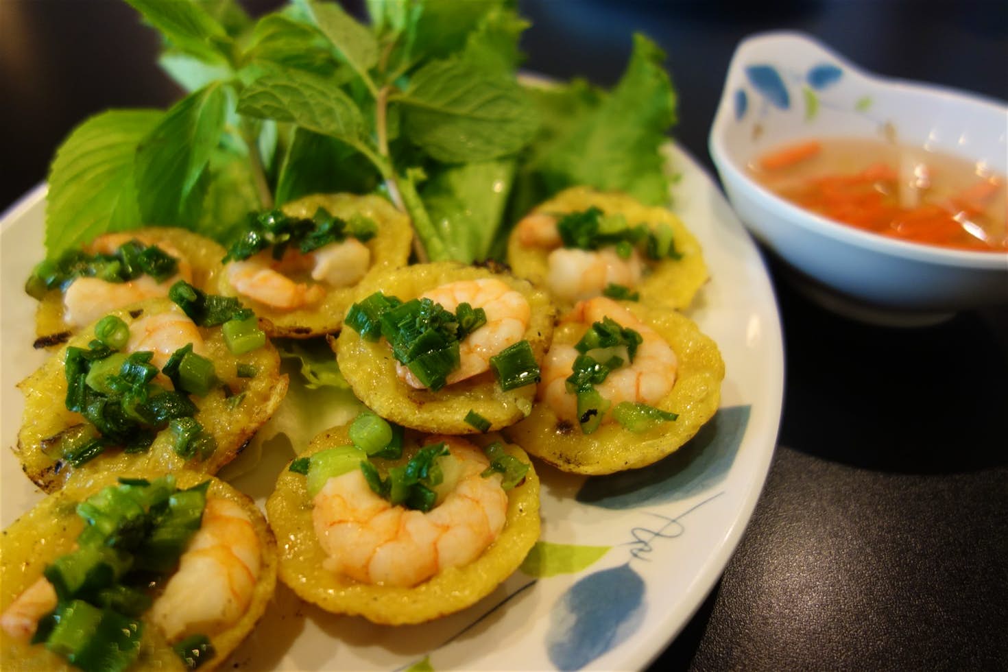 A plate of bánh khot © kennejima / CC BY 2.0 A plate of bánh khot © kennejima / CC BY 2.0